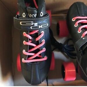 Roller Skates. New-Still wheels are more coral/ pink than red